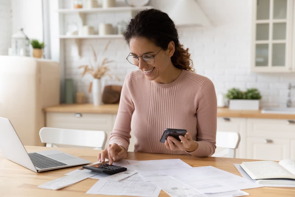 Woman using a calculator