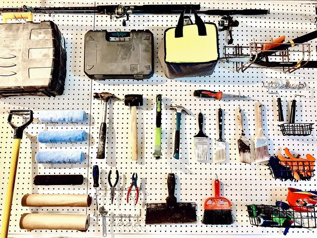 https://www.extraspace.com/blog/wp-content/uploads/2018/04/attic-organization-ideas-mount-a-pegboard.jpeg.webp