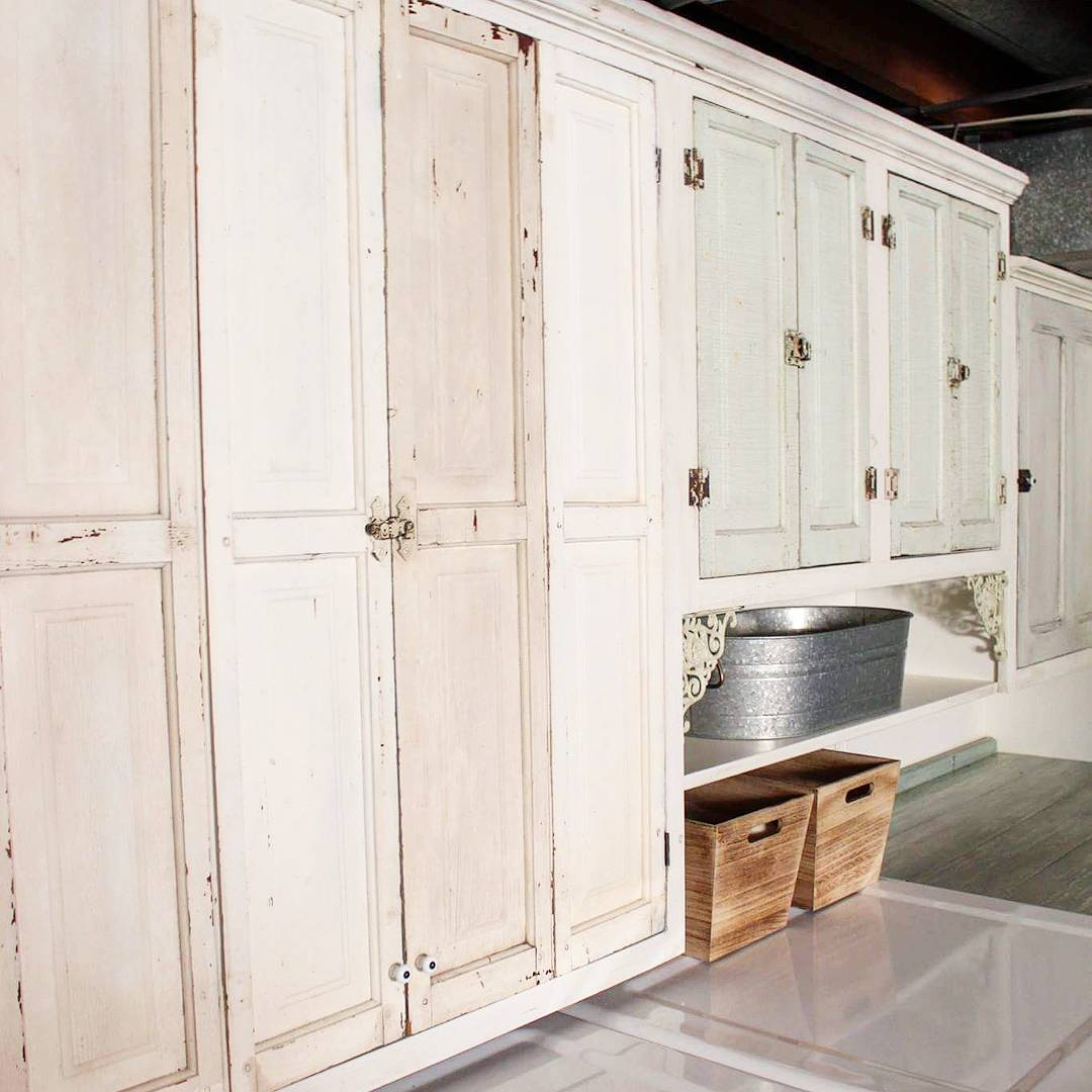 https://www.extraspace.com/blog/wp-content/uploads/2018/10/basement-design-organization-ideas-repurpose-kitchen-cabinets.jpg