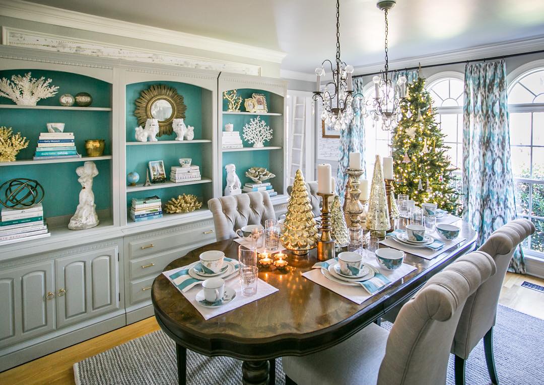 Elegant Dining Room Table Decorated for Christmas with Mini Trees. Photo by Instagram user @craighutsonphoto
