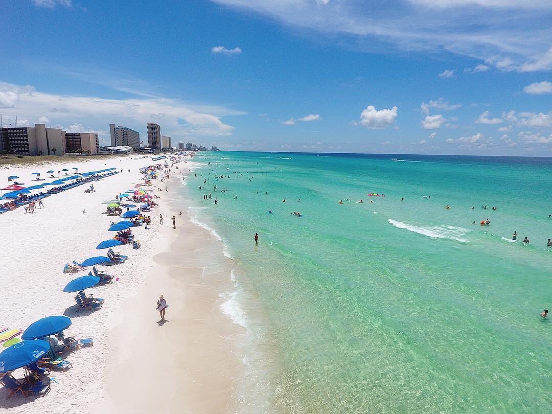 Skyline of the beach and clear waters in Panama City Beach. Photo by Instagram user @adventuresatseapcb