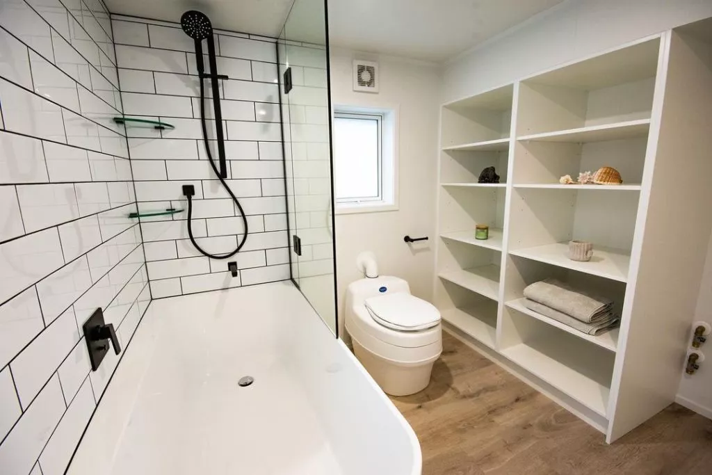 https://www.extraspace.com/blog/wp-content/uploads/2019/11/Add-Shelving-to-the-Bathroom-1024x683.jpeg.webp