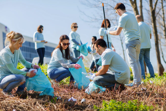 Group of volunteers cleaning up neighborhood