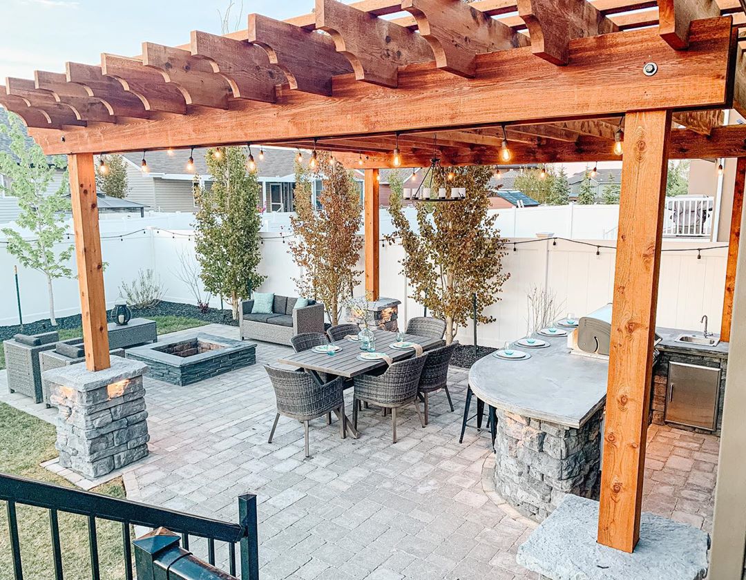 Backyard Living Space with Wooden Pergola. Photo by Instagram user @littlehouseintheprairies