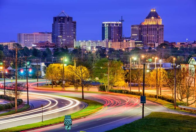 An image of the Greensboro skyline at night.