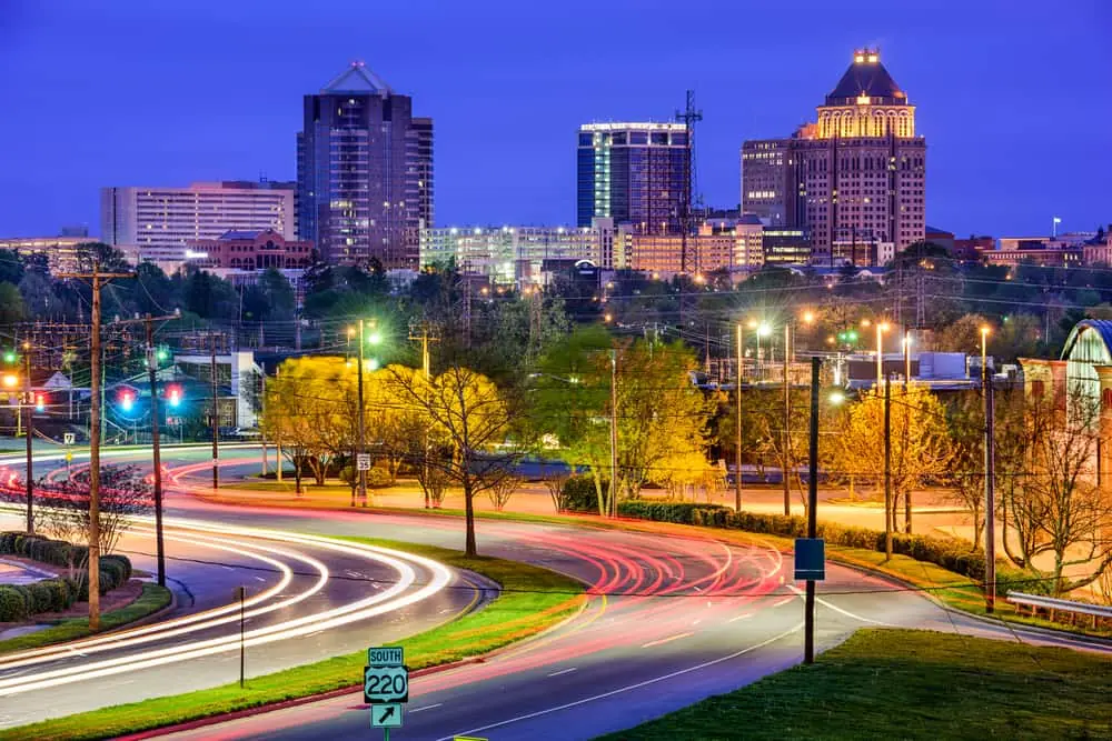 An image of the Greensboro skyline at night.